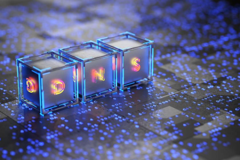 Drei blaue Würfel mit den Buchstaben DNS darin.