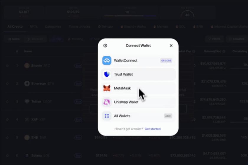 Screenshot der Webseite coinmarketcap.com mit betrügerischem Popup, das Nutzer dazu auffordert, ihre Wallet zu verbinden.