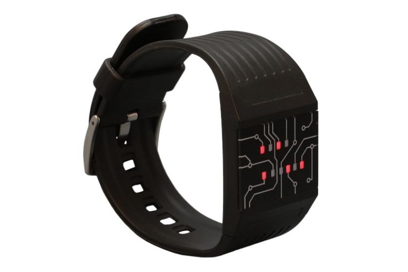 Eine schwarze Armbanduhr mit einer binären Zeitanzeige in Form roter Punkte auf dem Display.